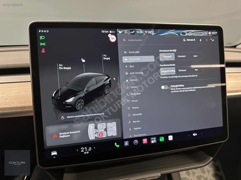 Tesla Model Y RWD (Legacy) — 25